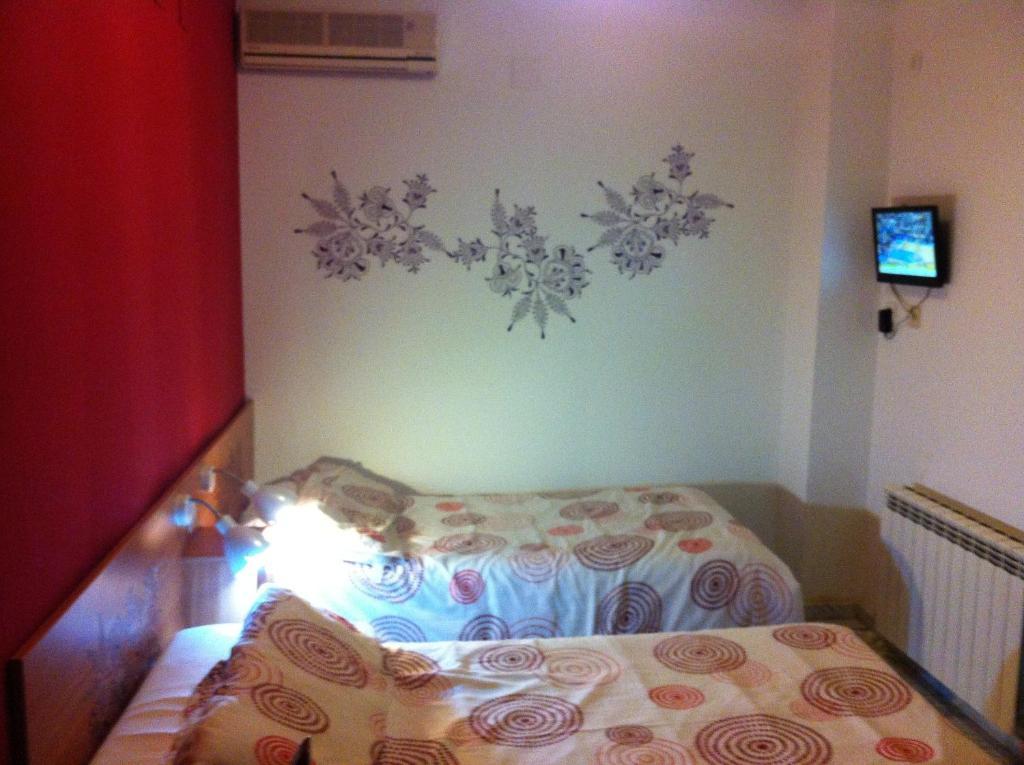 Hostal Neptuno Caces Стая снимка